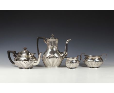 A highly impressive silver four piece tea & coffee set Mappin & Webb Ltd, Sheffield 1901, comprising a teapot, coffee pot, mi