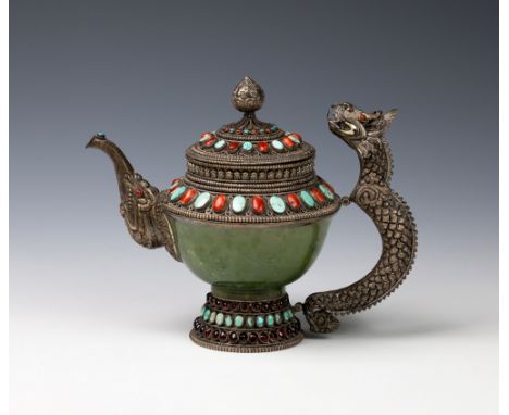 A Tibetan jade, silver and turquoise teapot20th century, the polished spinach jade bowl on a turquoise and red stone silver f