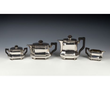 A German Art Deco silver four piece tea and coffee service 1920s-30s, comprising teapot, coffee pot, twin handled covered suc