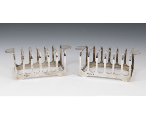 A pair of George V Art Deco style silver seven bar toast racksElkington &amp; Co., Birmingham, 1921 &amp; 1922, of plain form