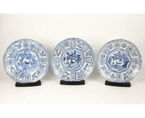 Three Chinese porcelain kraak blue and white dishes from the Hatcher Cargo, mid 17th century, Wanli period, deeply dished wit