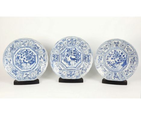 Three Chinese porcelain kraak blue and white dishes from the Hatcher Cargo, mid 17th century, Wanli period, deeply dished wit