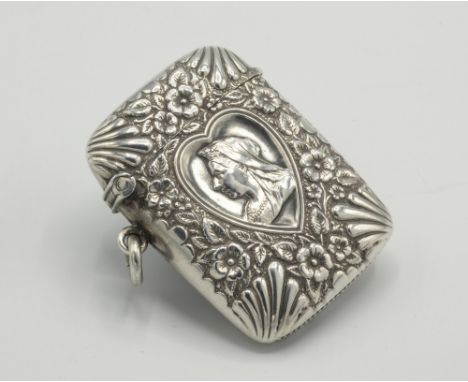 A scarce Victorian silver Art Nouveau vesta case Charles Lyster & Son, Chester 1900, the vesta heavily embossed with a floral