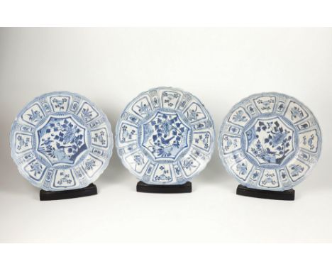 Three Chinese porcelain kraak blue and white dishes from the Hatcher Cargo, mid 17th century, Wanli period, deeply dished wit