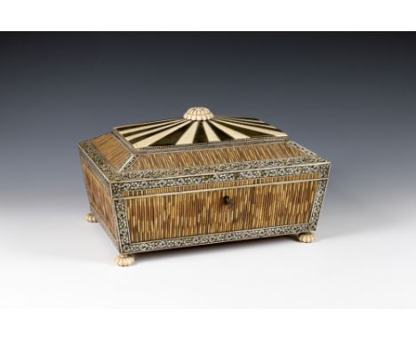 An Anglo-Indian Vizagapatam horn, ivory, penwork and quillwork work box19th century, sarcophagus form, decorated with penwork