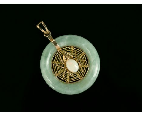 A 14ct yellow gold, jade and opal spider's web pendantthe pale mottled celadon ring centred by a gold web and a spider set wi