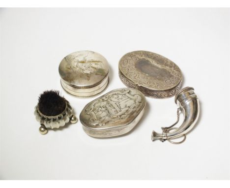 A white metal oval snuff box with bright cut engraved decoration, together with a white metal cornucopia box, two further whi