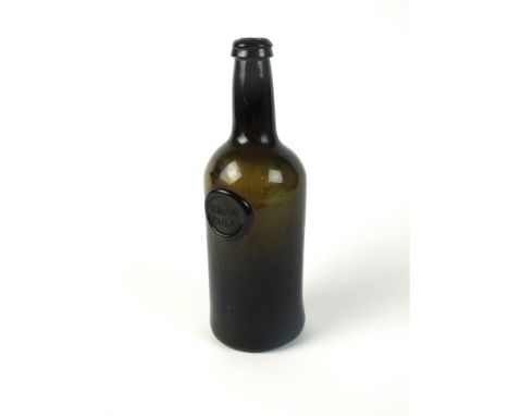 A Cambridge University 'Emanuel College' sealed cylinder wine bottle circa 1830-40, seal with 'Eman Coll', 26cm high The spel