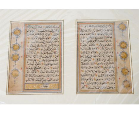A Safavid Persia illuminated manuscript page from a Koran, dated to AD1559, , nasta'liq script with marginal roundels in gold