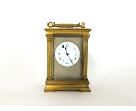 A French gilt brass carriage clock, late 19 th century, the five bevelled glass case with 2 inch white enamel dial and Roman 