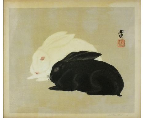 Yoshijiro Urushibara (1888-1953) (Mokuchu) A Japanese woodblock print of a black rabbit and a white rabbit, black printed sig