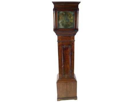 A George III oak longcase clock the square hood enclosing a 12” brass dial with Roman numerals subsidiary seconds dial and da