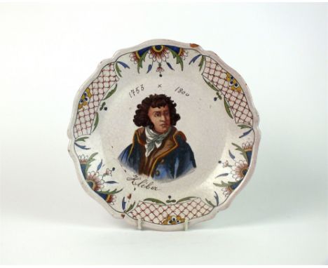 A Rouen faience French Revolutionary commemorative plate 19th century, painted in polychrome with a head and shoulders portra