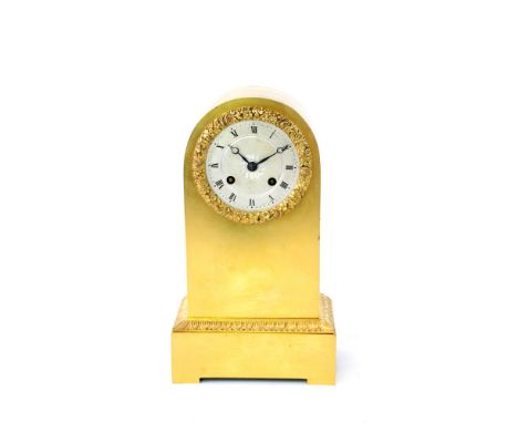 Louis Philippe ormolu mantel clock, the 3.5 inch engine turned silvered dial with Roman numerals within a foliate cast raised