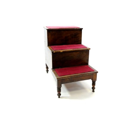 A set of Regency mahogany bed steps early 19th century with three treads later carpeted, the top step with hinged cover and r