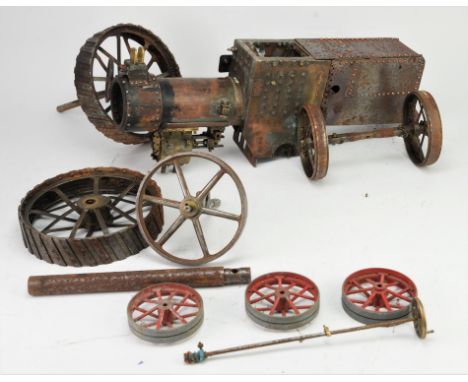 Partial constructed steel and copper steam engine/traction engine, with additional engineered items, to include wheels and fl