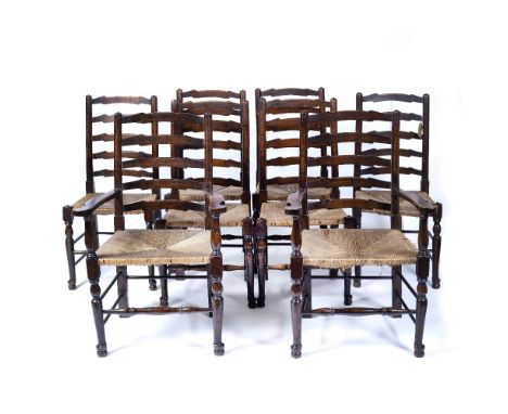 Set of eight oak ladder back chairs with rush seats (8)