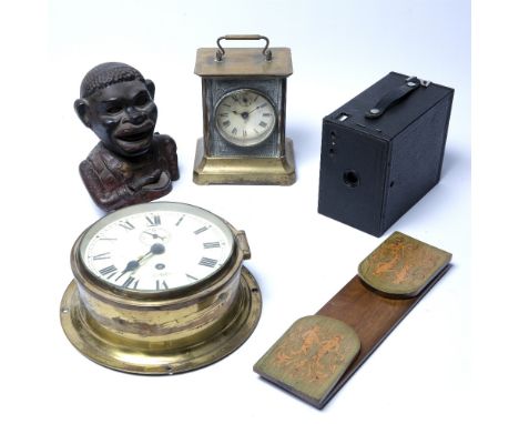 Brass lacquered ships clock,  marquetry inlaid bookends, cast iron money box, clock and a camera (5)