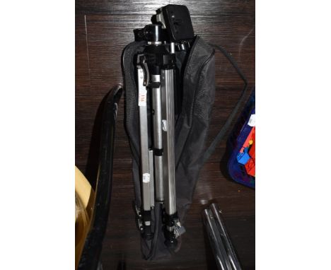 A photographers camera tripod in carry case the Helios T - 1