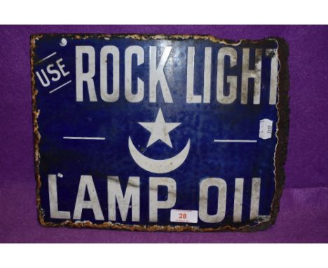 A partial enamel double sided advertising sign for Rock Light Lamp Oil
