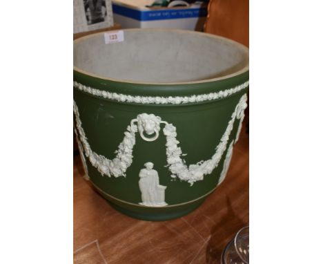 A large ceramic jasper ware planter stamped Wedgwood to base 23cm high in an sage green
Manufacturing defect to base otherwis