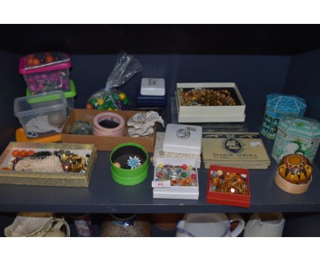 A selection of jewellery makers and craft beads including glass ceramic and early plastic types