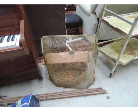 A fire guard, book trough etc