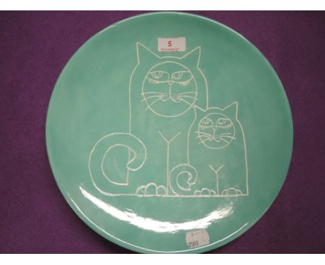 A vintage ceramic display plate with cat and kitten design marked VJP to rear