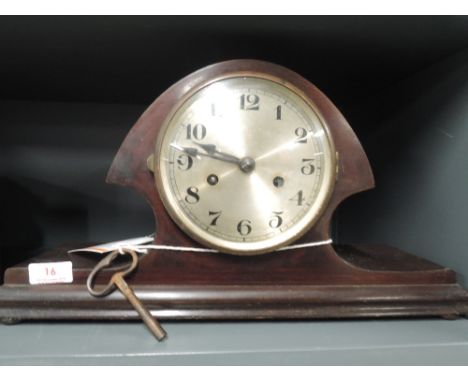 A vintage mantle clock with chime in a Napoleonic designSlight wear ro case, appears to be working