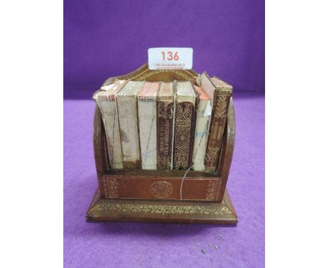 A miniature book trough and Italian books