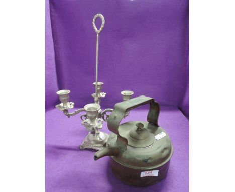A vintage copper barge canal kettle and candle stick