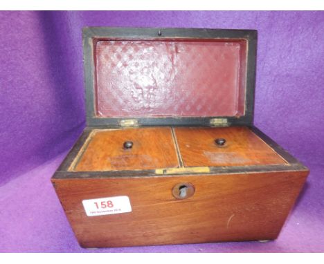 A vintage treen wood tea caddy with interior divide