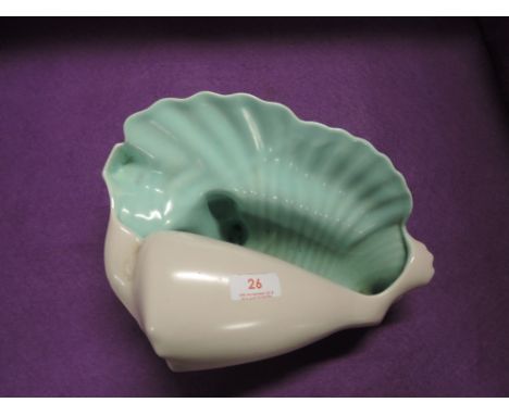 A vintage sea shell bathroom decoration by Poole