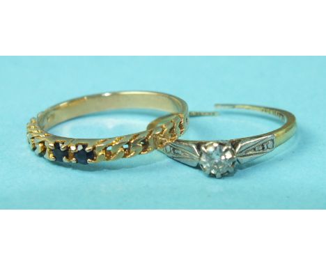 A solitaire diamond ring in 18ct gold mount, (a/f), 1.4g and a 14ct gold ring set two sapphires, size K½, 1.9g, (2).