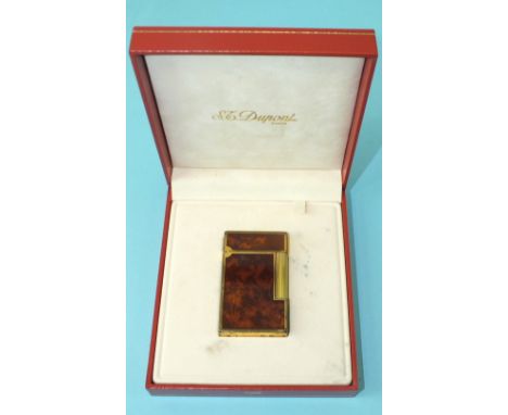 An ST Dupont gilt metal and lacque-de-chine pocket lighter numbered 15JCC86, with box and booklet, (lighter worn).