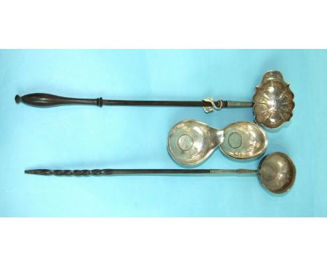 A Georgian toddy ladle with turned wood handles, London 1760, possibly by John Muns, another with plain circular bowl, inset 