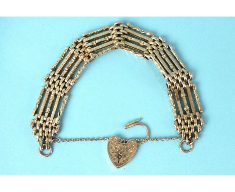 A 9ct rose gold gate-link bracelet with engraved decoration and padlock clasp, 20.6g.