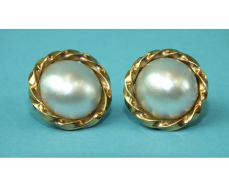 A pair of 9ct gold mabé pearl earrings, 18mm diameter, 8.1g.