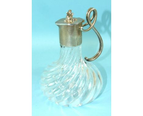A Fabergé Russian silver-mounted glass jug, the hinged lid with cast foliate finial and double-wire 'S'-form handle, the writ