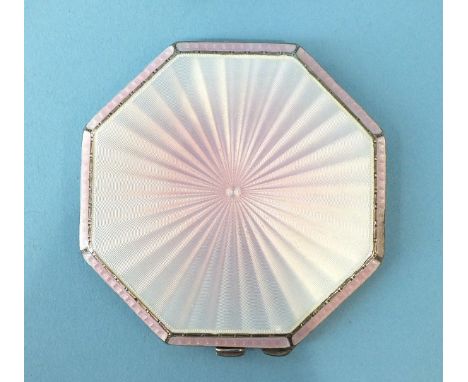 A hexagonal silver powder compact, the bevelled lid with pink guilloche enamel, maker Albert Carter, Birmingham 1936, 72mm.