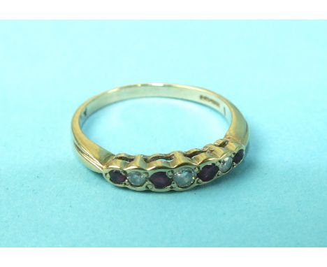 A seven-stone ruby and diamond half-hoop ring with 9ct gold mount, size Q½, 2.3g.