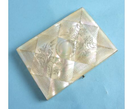 A late-Victorian mother-of-pearl parquetry visiting card case engraved with foliate decoration, opening to reveal a bellows c