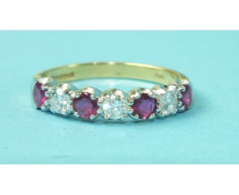 A ruby and diamond half-hoop ring alternately-set four round-cut rubies and three brilliant-cut diamonds, in 18ct gold mount,