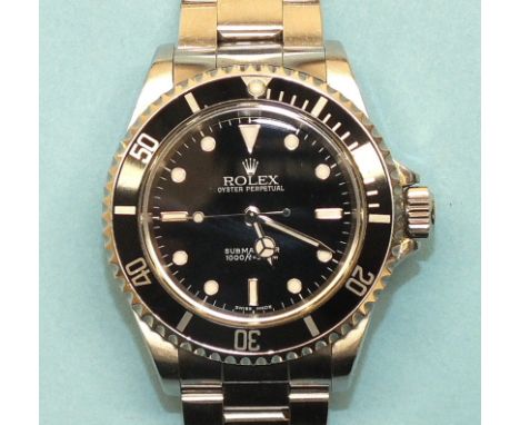 Rolex, a gentleman's Rolex Oyster Perpetual Submariner wrist watch c2005, the black dial with luminous triangle, dot and bato