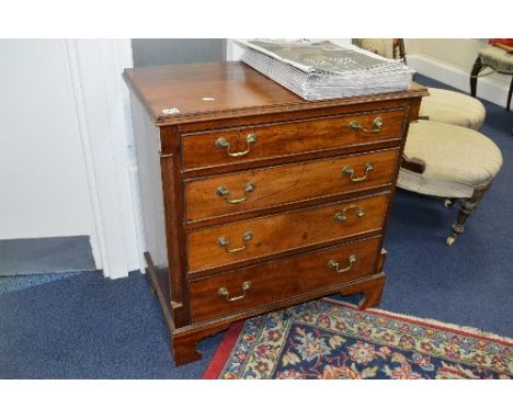 A GEORGIAN STYLE MAHOGANY BATCHELORS CHEST, of four long graduating drawers with brass swan neck handles on bracket feet, app