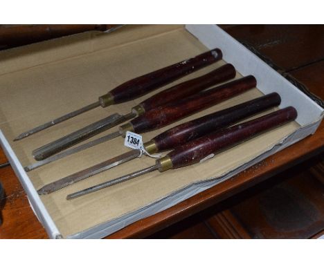 A TRAY CONTAINING FIVE VINTAGE HAND CHISELS, including a Record power chisel