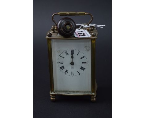 A FRENCH BRASS CARRIAGE CLOCK, height 10cm (key)