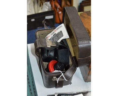 AN ASHAI PENTAX AUTO 110 SYSTEM CAMERA, together with flash, accessories, carry holdall etc 