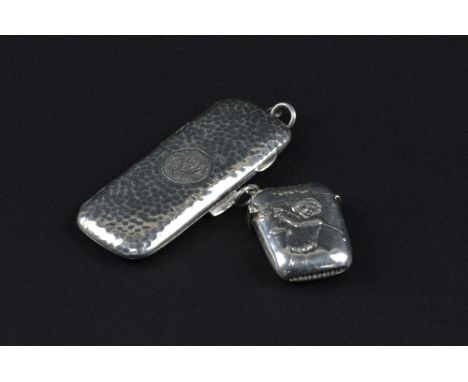 A SILVER VESTA WITH GOLFING IMAGE, and a small silver cigarette case (Chester 1911) approximate weight 50.1 grams