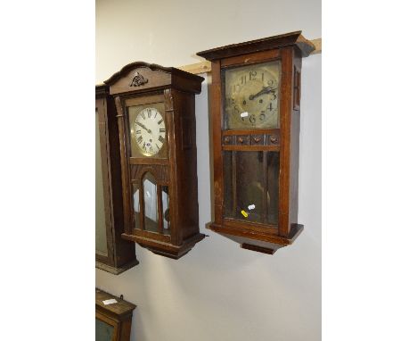 AN OAK CASED WALL CLOCK, and a mahogany wall clock (two winding keys) (2)